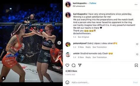 Crowd left stunned after two MMA fighters kiss during。